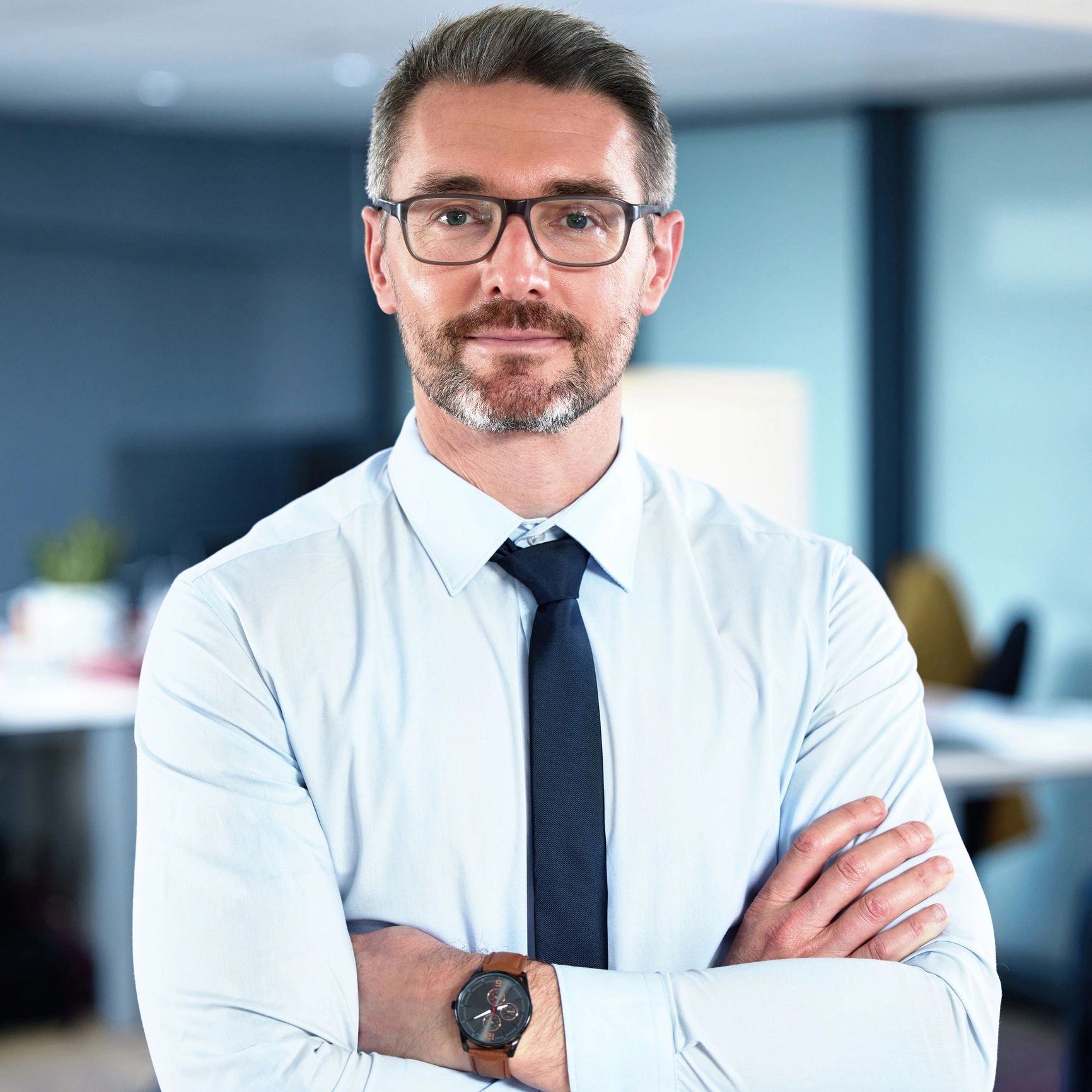 Professional headshot of a business manager