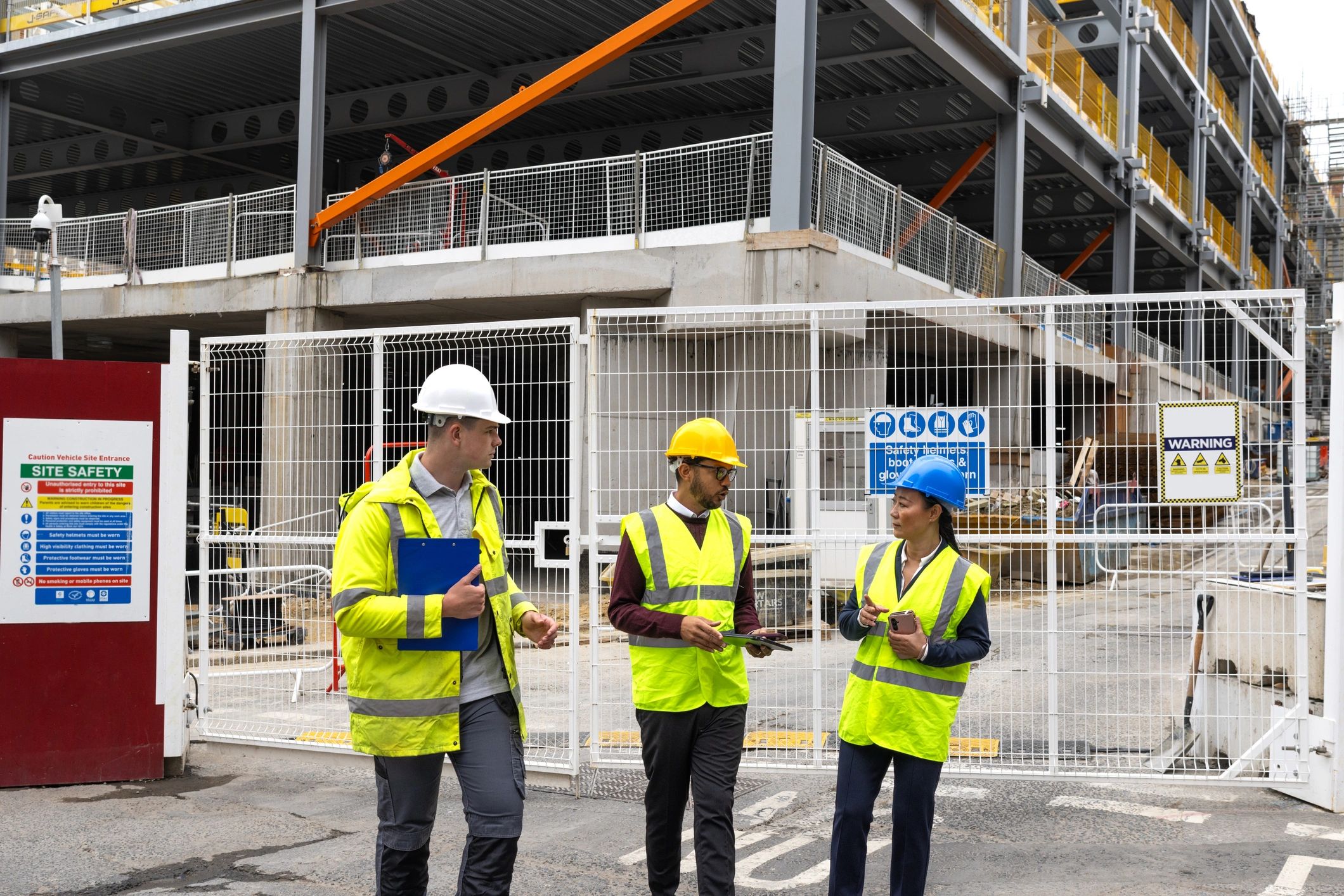 Construction team reviewing plans on site